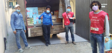 Recupero e distribuzione cibo a Torino: diario del mio primo giorno burrascoso da volontario